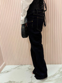 Jeans vita bassa tela elastica nero con cuciture