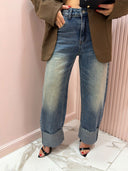 Jeans sfumato con piegone