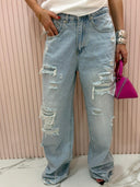 Jeans denim chiaro con strappi
