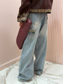 Jeans risvolto e strappi