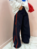 Jeans palazzo riprese rosse