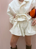 Shorts denim bianco a pieghe palloncino