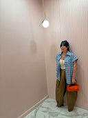 Camicia smanicata quadri celeste