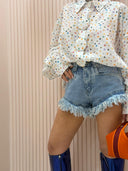 Shorts denim sfrangiato