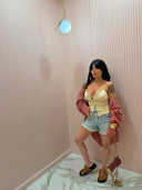 Shorts denim sfrangiato