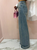 Jeans con piegone