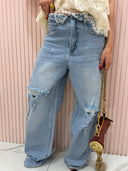 Jeans risvolto in vita e strappi